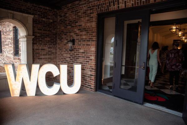 Decorative lights spelling "WCU" outside the 2023 annual Mountaineer Gala